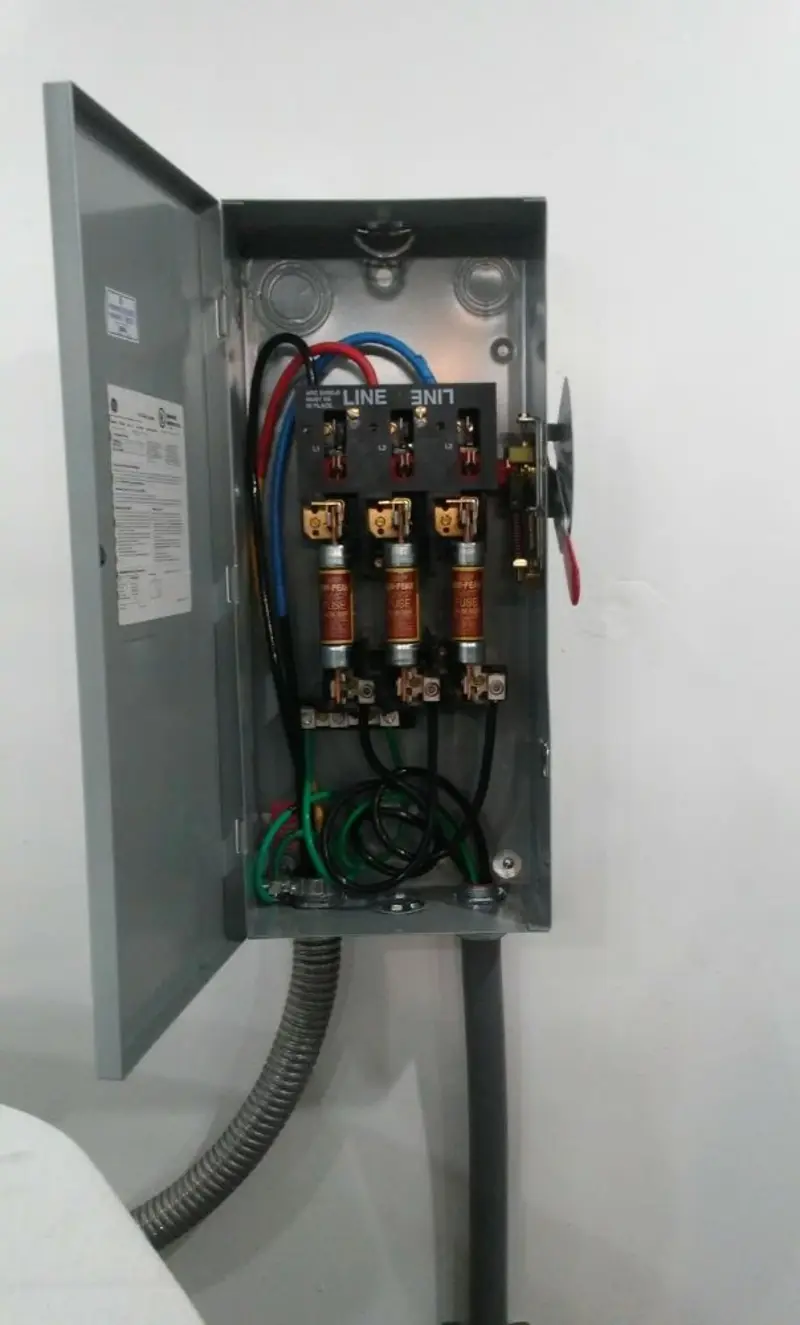 Three-phase disconnect switch installed for Smoke Detector Installation in Goulds